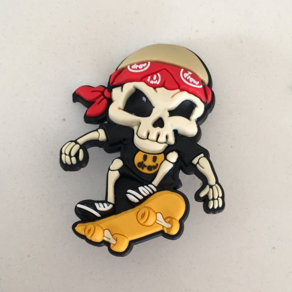 Justin Bieber authentic skeleton skateboarding charm. Brand new.